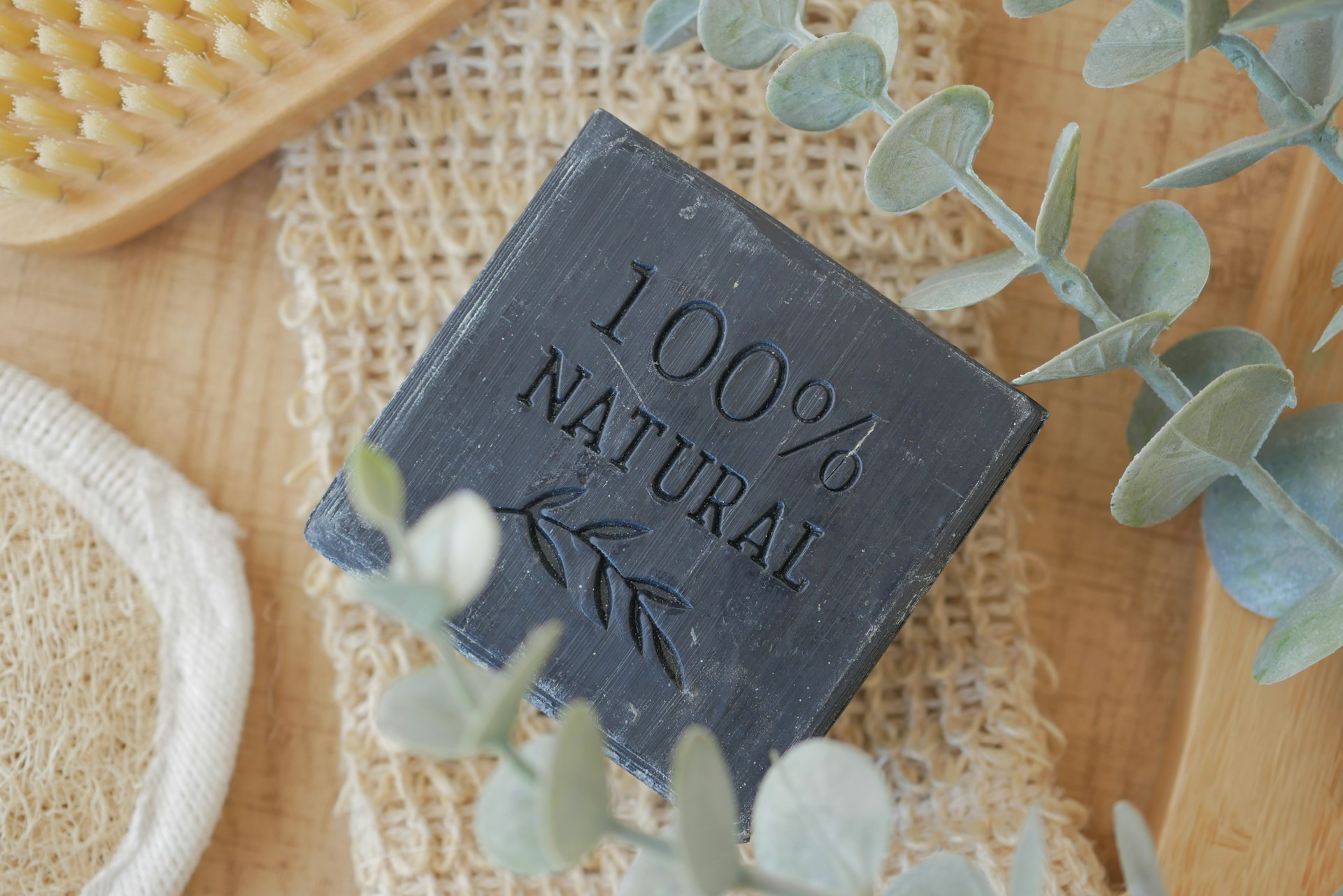 A soap bar sitting on top of a wooden table